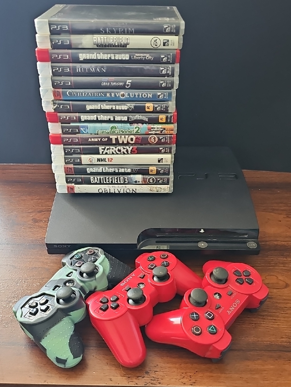 Sony PS3 Slim Bundle with 3 Controllers and 15 Games - Good
